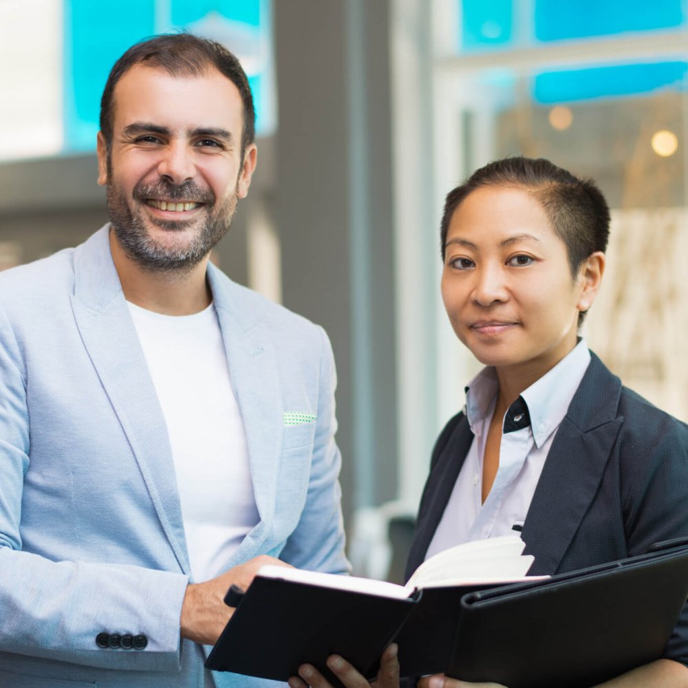 portrait-successful-mid-adult-leader-his-female-assistant